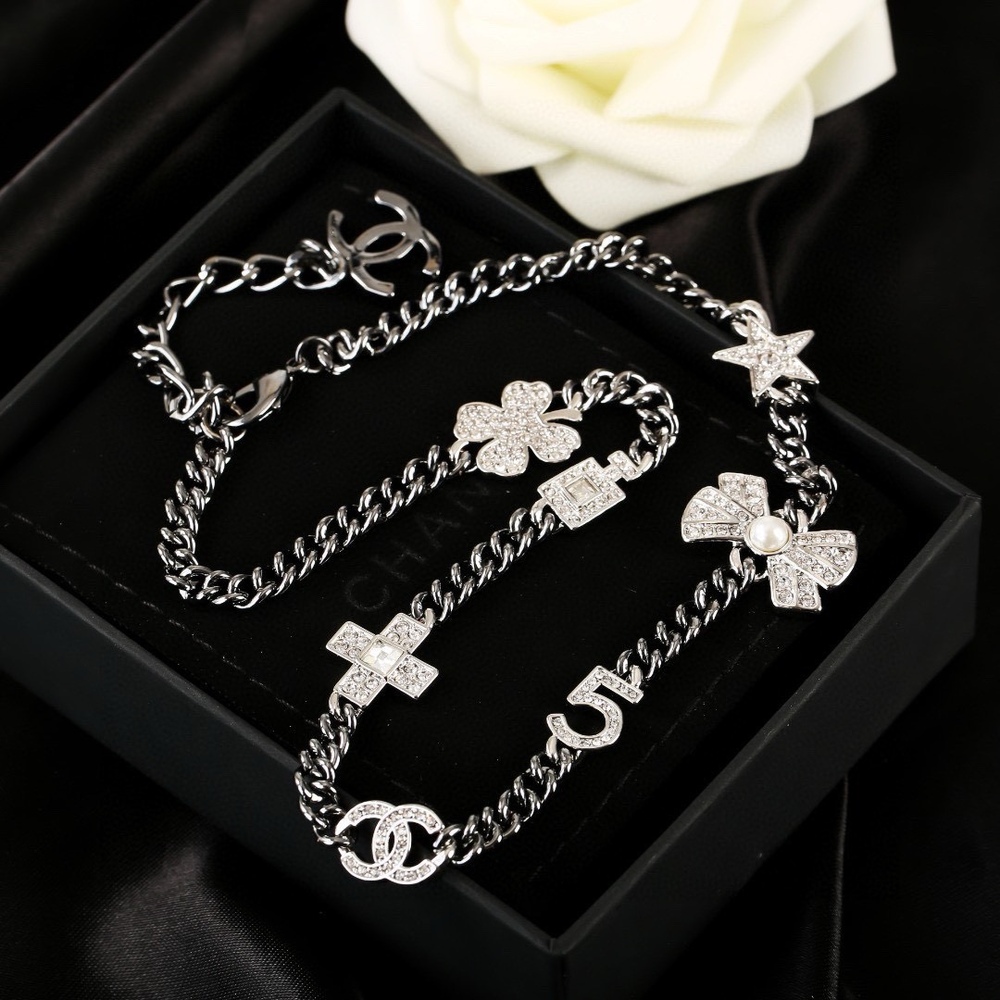 CHANEL Multi-Charm Crystal Embellished Chain Necklace